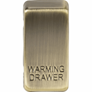 Knightsbridge Antique Brass Switch cover marked WARMING DRAWER